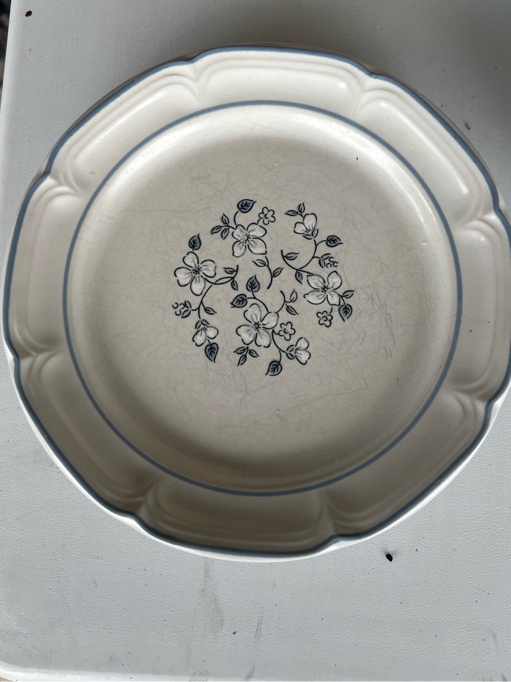 Covington Cream Stoneware Dinner Set with Blue Floral Motif